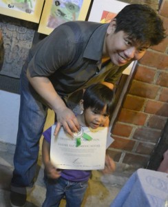 Eli receives his certificate